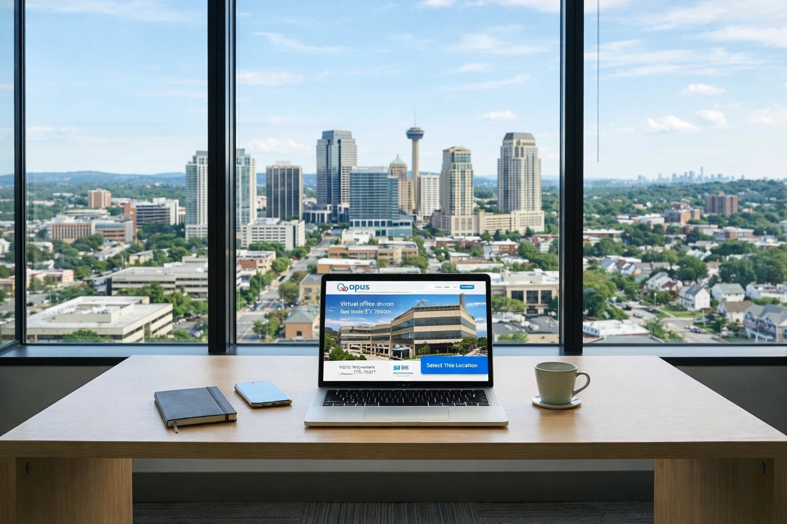 Laptop on desk displaying virtual office website with city skyline view through large windows.