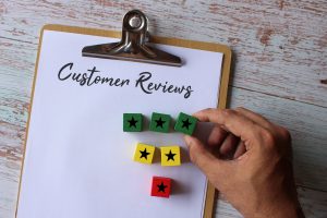 A clipboard featuring customer reviews.